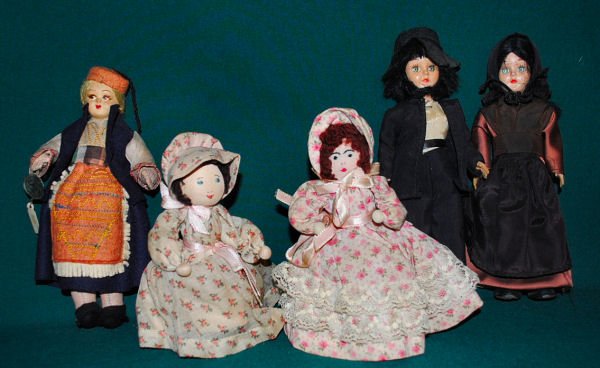 Lot of 5 Vintage Dolls: Variety of five vintage/antique small dolls including 2 handmade Amish dolls (plastic bodies), 2 handmade clothespin dolls and one Italian Eros doll (made in Florence) named "Zara" with original tags.