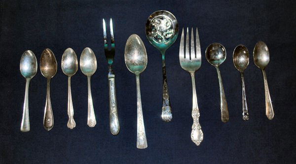 Lot of 11: Silver Serveware & Spoons: Lot of 11 varietal silver flatware including 4 serving forks/spoons, sugar spoons, regular spoons. Marks include Rogers Bros, Plymouth, Italy, Wm Rogers Mfg, International Silver, Victors, Niagara, Sh