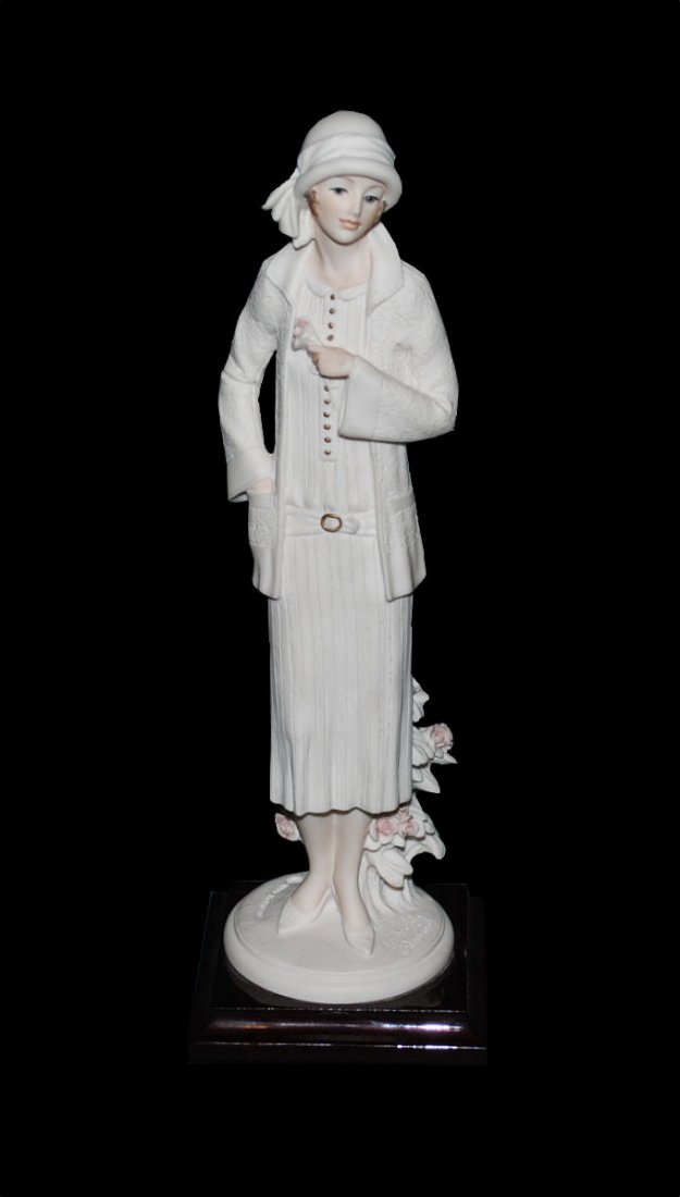 GIUSEPPE ARMANI (1935-2006) Signed Figurine 'Nancy': GIUSEPPE ARMANI (1935-2006) Woman Figurine 'Nancy', 1999. Giuseppe Armani, born in Calci, Italy, was recognized and commissioned by Florence Sculture d'Arte in 1975 and given free reign to design his 