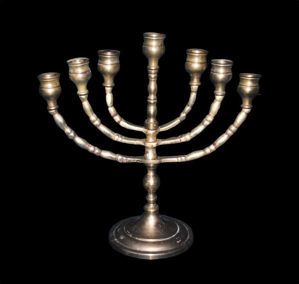 Vintage Brass Menorah/Candelabra: Sturdy vintage brass menorah candle holder or candelabra. Dual purpose. Can be used for either as arms swivel for presentation purposes. Mark on bottom is "CM". 10.5"w x 10.5" h x 4.5"d.