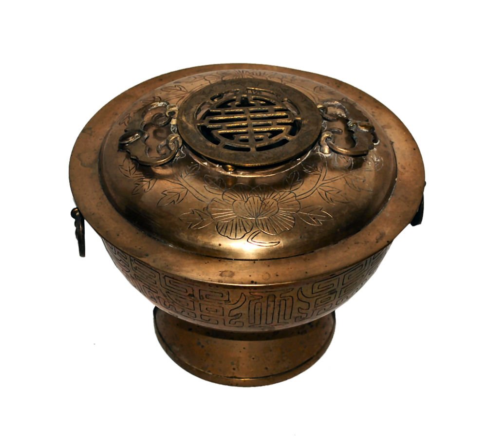 Chinese Brass Censer: Vintage Chinese brass censer with etched floral design on top and sides. Handles are unique and in the shape of bats. 8"w x 7"h.