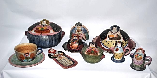 Set/14 Italian Ceramics: 14-pc ceramic serveware by Italica ARS, Italy. Theme features women in clothing with faces on each lid handle. Muted tones of blues, pinks and yellows. Set includes covered platter, covered bean dish,