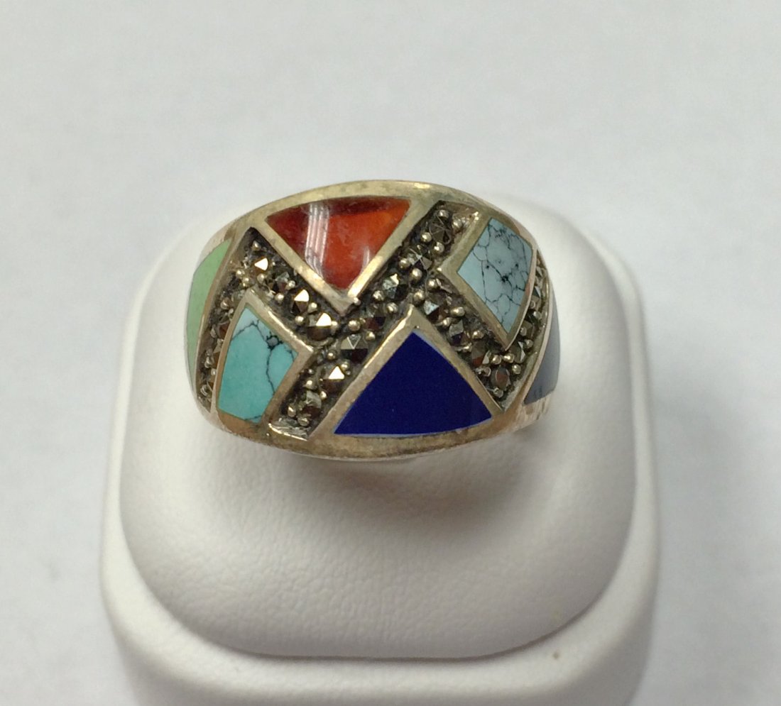 Marcasite & Gemstone Ring: Sterling silver wide band ring of marcasite, lapiz, turquoise & coral. Marked. Size 8.5