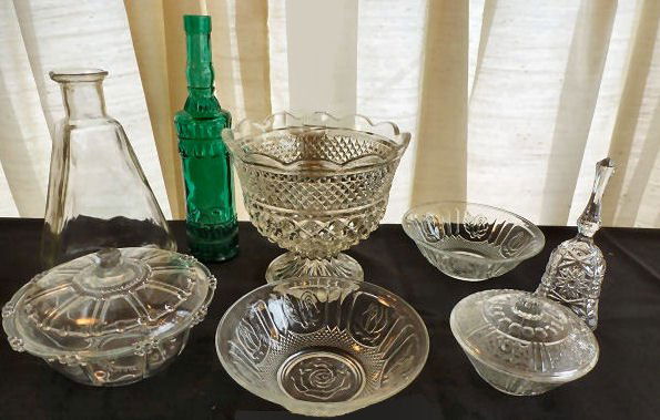 Lot/8 Vintage Cut Crystal Serveware, Bottle, Decanter,: Lot of 8 vintage cut crystal & depression glass collection - includes two covered bowls, two open bowls, triangular decanter, green handblown glass bottle, bell, and large footed bowl.
