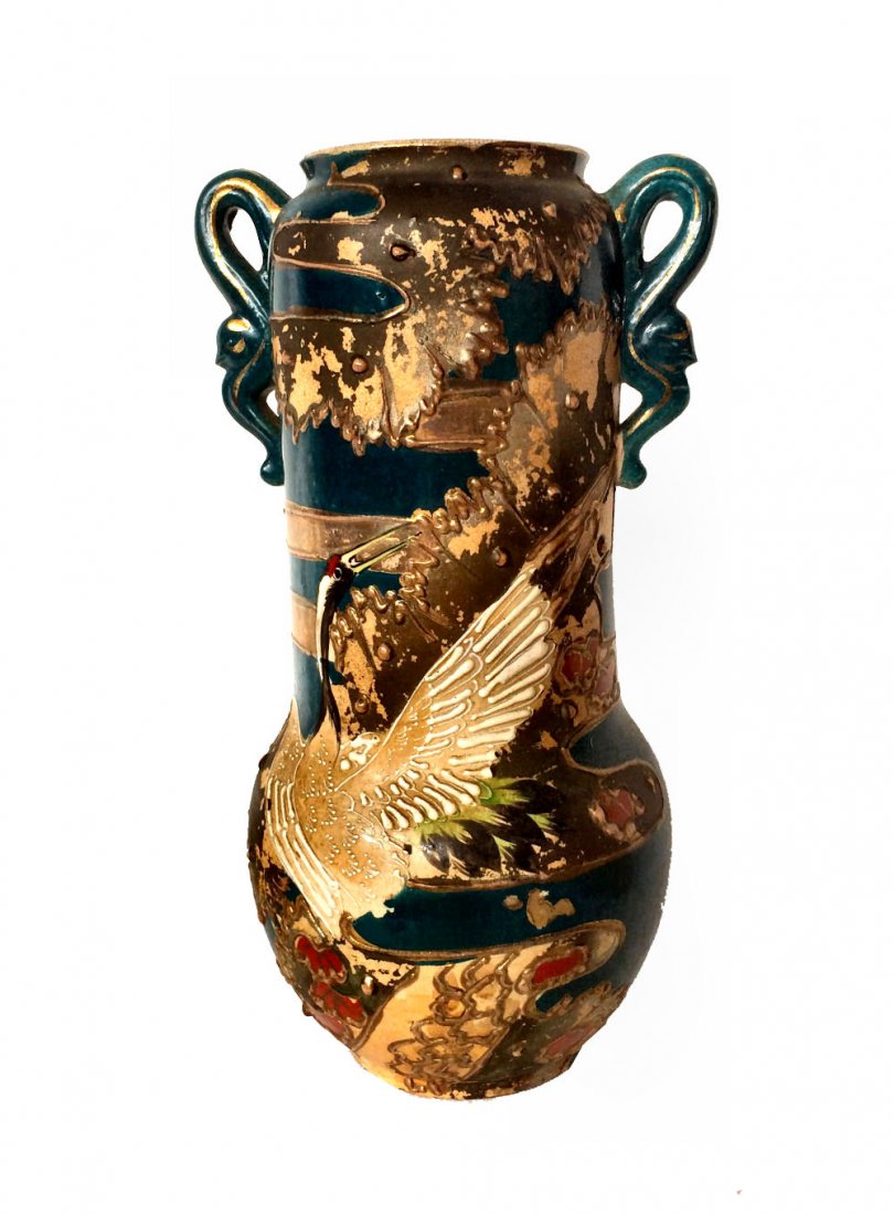Antique Teal Asian Vase: Very old ribbon-handled 12" Asian vase featuring painted crane on one side and two painted flowers on the other. Jade green and brown pigment painting and gold gilt embossed outline. Unmarked.