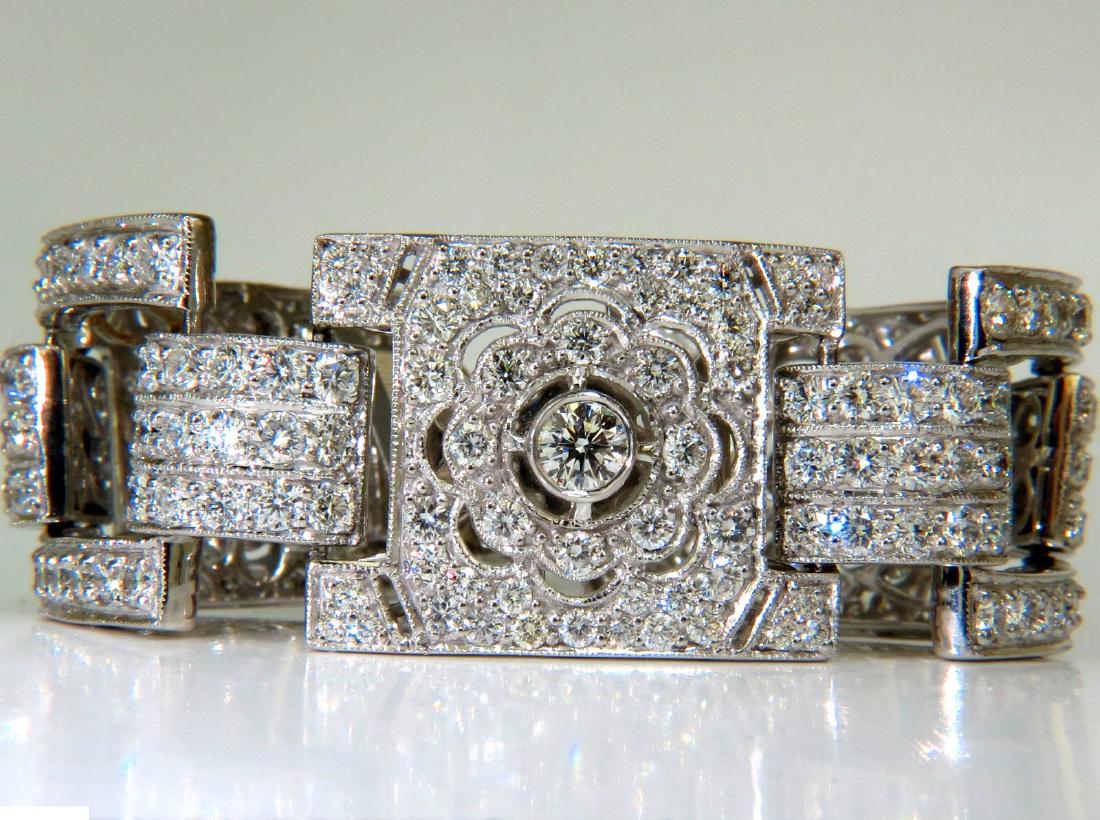 18KT 20.00CT DIAMONDS ART DECO CLASSIC LINK CUFF: Classic Art Deco Revival Fashion20.00ct. Diamonds braceletClassic Clustershand linked, gives diamonds chance to sparkle every angleVs-1 Vs-2 clarity F-G color18kt. White gold86 grams - Heavy$80,000 ap