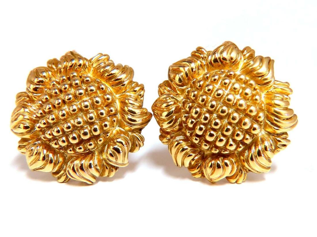 Sunflower Blossom Clip On Earring Omega 14 Karat: Sunflower BlossomTextured clip on EarringsMeasurements of Earrings:Diameter: 25mmDepth: 8mm5.8 grams / 14kt. yellow gold
