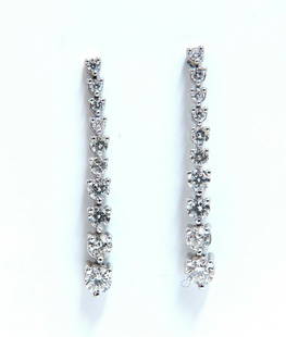 2.00ct Natural Diamonds Dangle Cascading Earrings 14 Kt: Cascading Diamonds Dangle earrings.The Mod Elegance.2.00cts of natural round diamonds: G-color, Vs-2 clarity.14kt. white gold4.4 grams.Earrings measure: 1.3 Inch LongComfortable butterfly closure$7,50