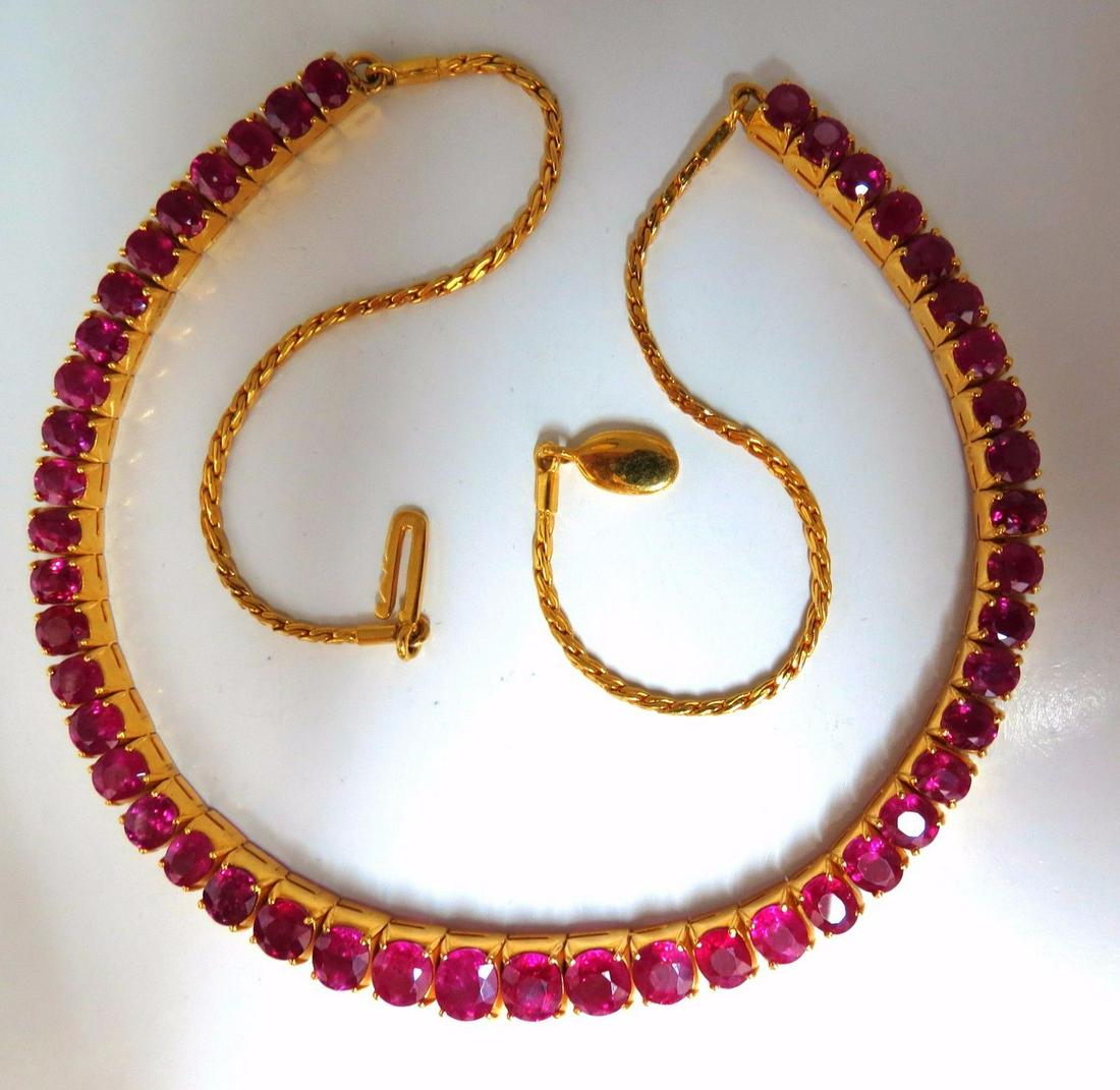 33.19ct Natural Ruby Tennis Necklace 18kt Prime Vivid: Red Classics. 33.19ct. Natural Ruby necklace.The Mod Tennis Comfort Elegance.Oval Shapes, Full cutclean clarity and transparent. Vivid Reds.47 RubiesTested, Only Heat Treated.Ranging from: 4.2 x 4mm t