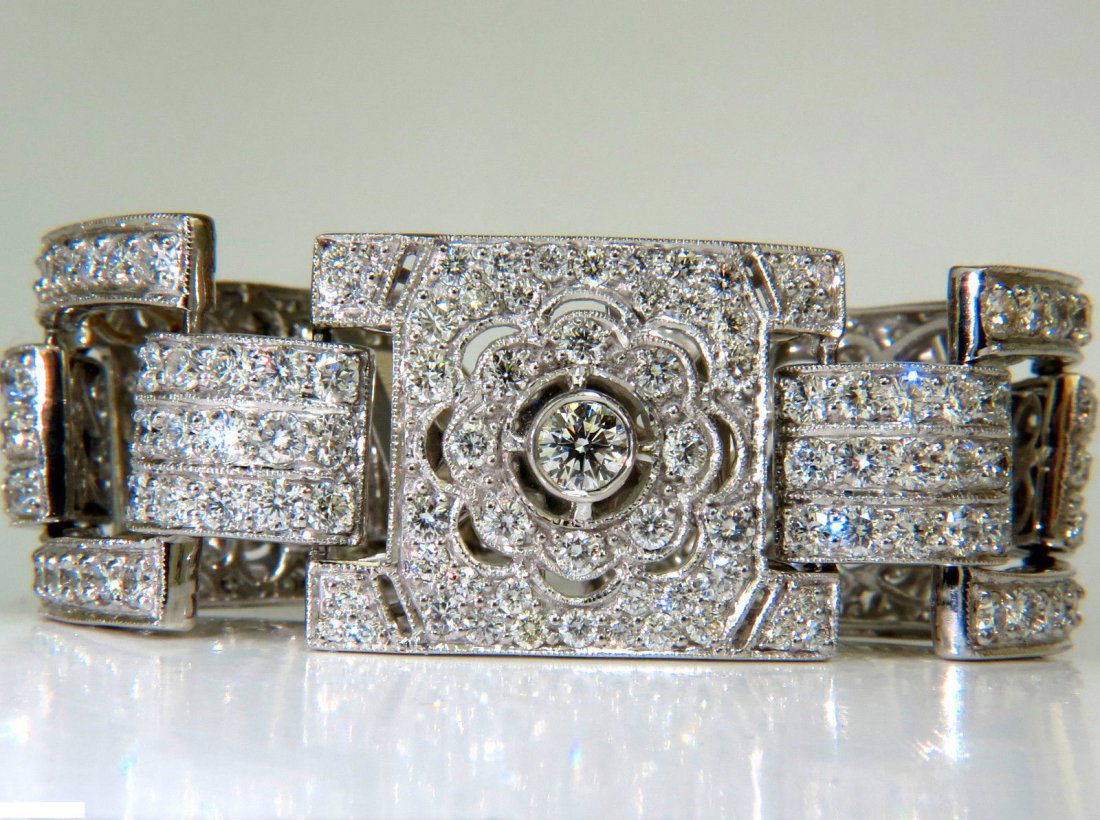 18KT 20.00CT DIAMONDS ART DECO CLASSIC LINK CUFF: 20.00ct. Diamonds bracelet Classic Clusters hand linked, gives diamonds chance to sparkle every angle Vs-1 Vs-2 clarity F-G color 18kt. White gold 86 grams - Heavy $80,000 appraisal will accompany 7.5