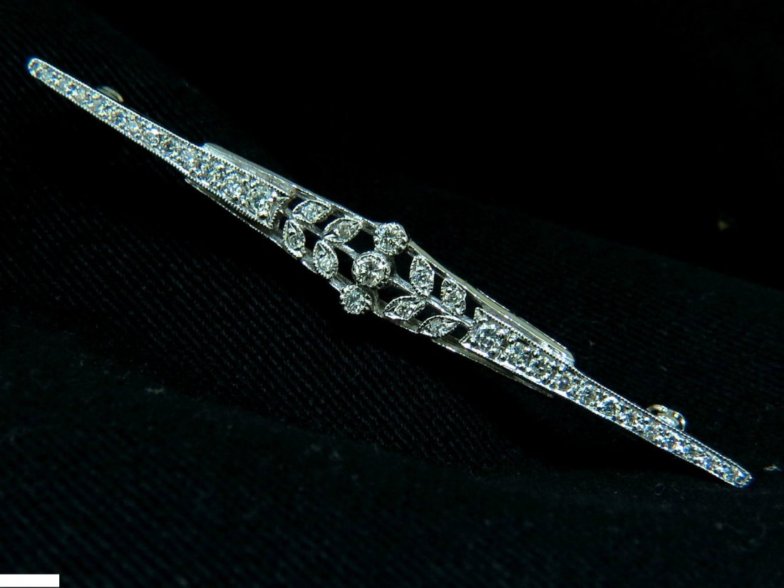 14KT GOLD 2.75 INCH LONG DIAMOND BROOCH PIN EDWARDIAN: 2.75 inches long. .75ct. diamonds G-color, Vs-2 clarity. 14kt. white gold. 5.8 Grams Center width: 9mm $3000 Appraisal will accompany
