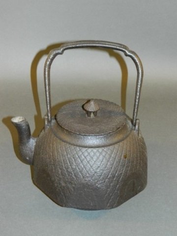 Japanese Cast Iron Teapot: Size : 10" Tall at Handle x 9.5" W. at spout.