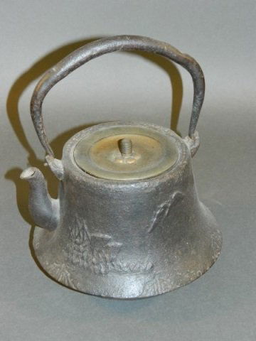 Japanese Cast Iron Teapot: Size : 10" T at handle x 8.5" W at spout.