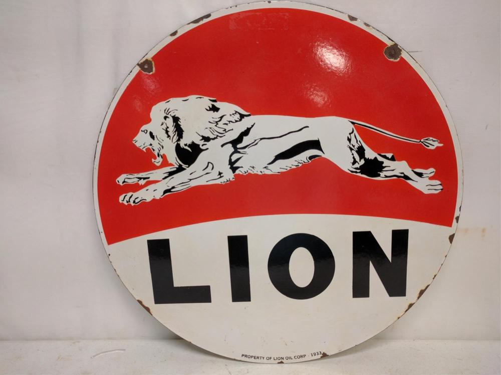 Porcelain Lion Oil Co., Corp. sign: Porcelain Lion Oil Co., Corp. sign 24" diameter double sided 1933 some rust and corrosion around holes and edges