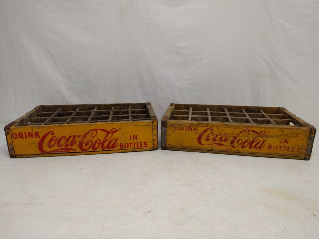 2 Vintage Drink Coca Cola Crates: divided for 24 bottles, it is a yellow crate one of the crates is rough on the bottom 18 1/2" L x 12" W x 4 1/2" T