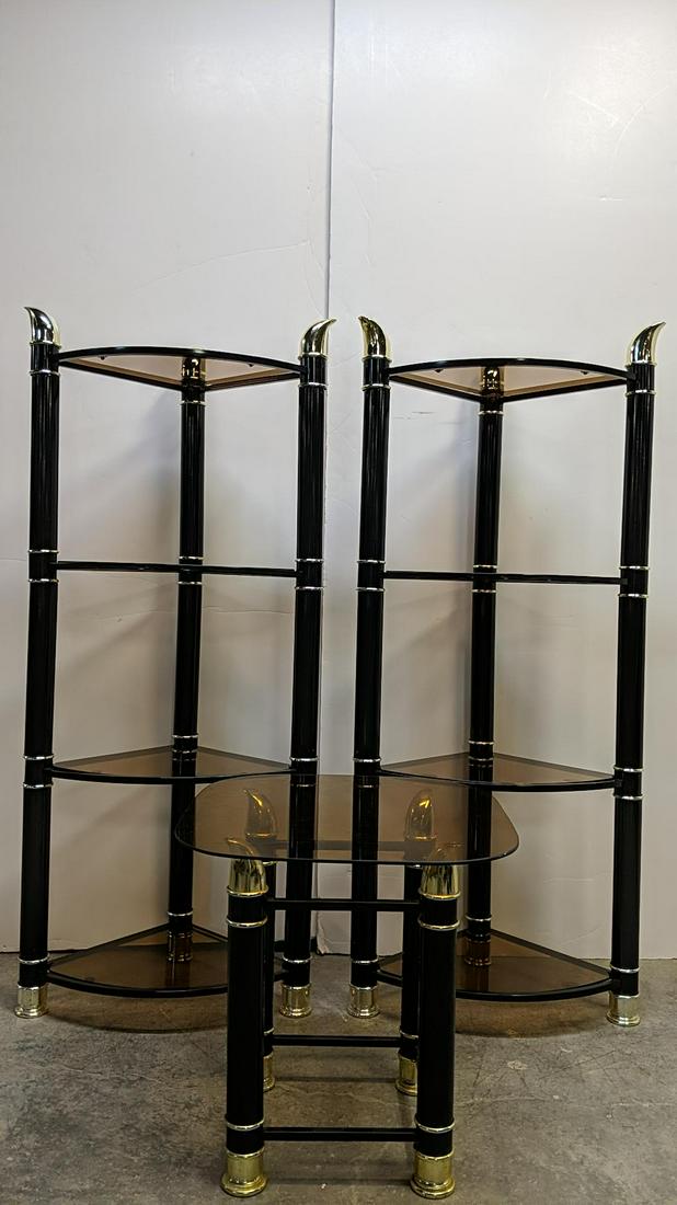 Mid Century Italian Tomasso Barbi shelves & table: 2 corner shelves and 1 end table Tusk Tables and shelves amber glass shelves black metal with brass trim corner cabinets are in good condition and measure 23" x 26" x 52" T and the table measures 19" 