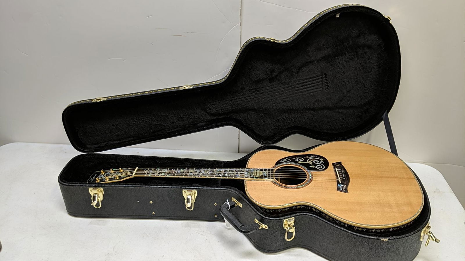 Lepore Inlaid Mother of pearl & Abalone guitar: Custom made Indian Rosewood Guitar 6 string Very ornate good condition hard case included serial # T7801 made in 2007 18" neck 42" L x 17" W