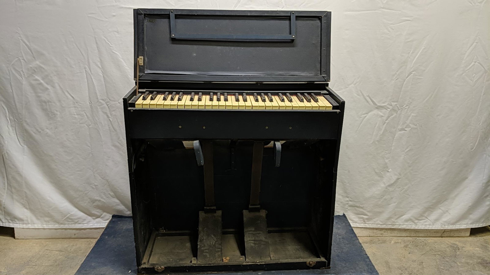 Portable Folding Estey Traveling pump organ: fold to suitcase size 30 5/8" W x 20" T x 12" D