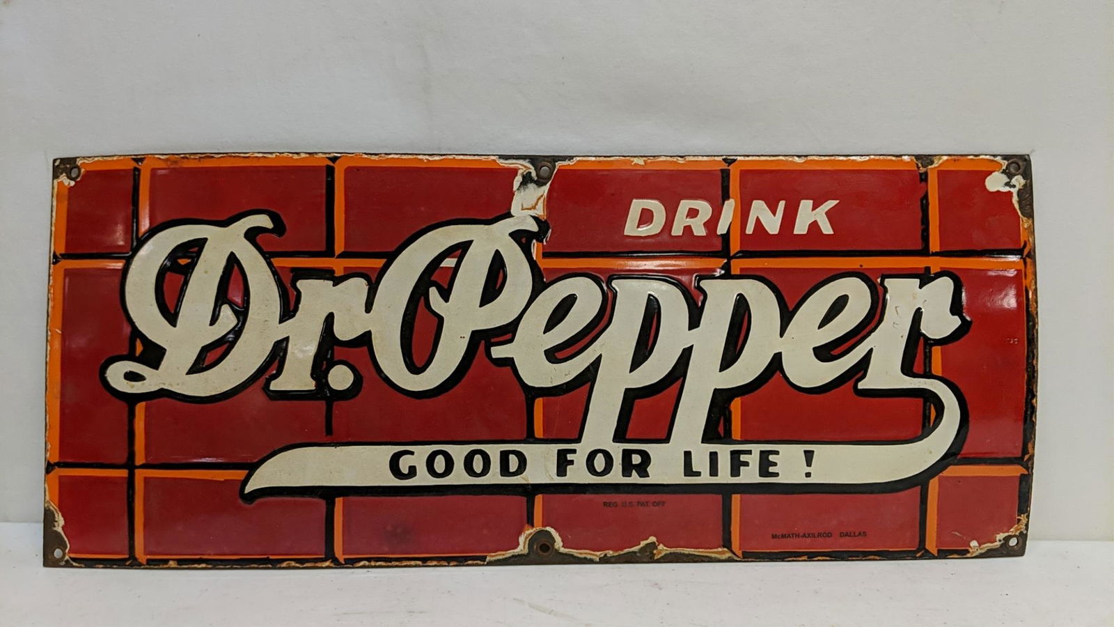 Porcelain Dr. Pepper single sided sign: dings and corrosion 24 1/4" x 10" T