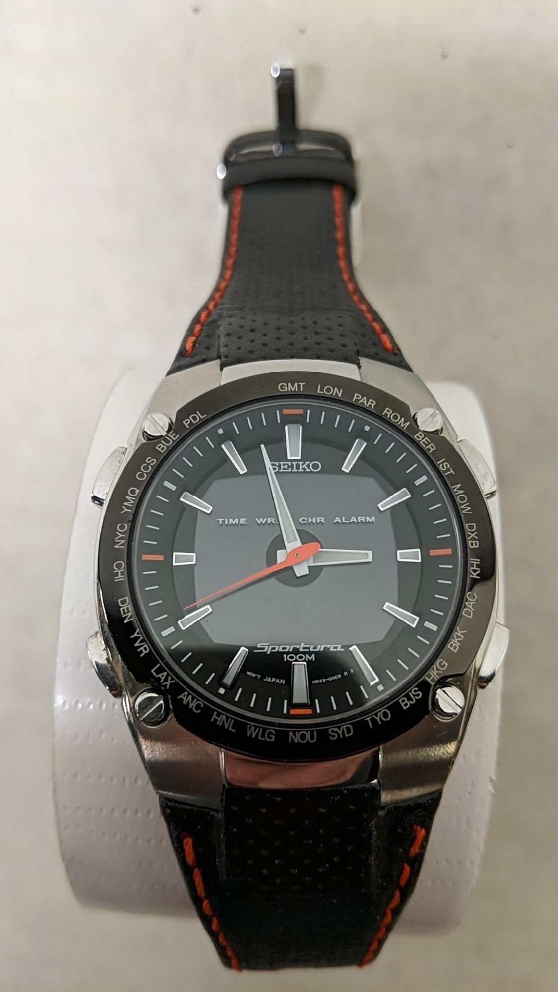 Seiko Sportura 100 meter watch: Not running Chronograph Alarm stainless steel serial # 577275