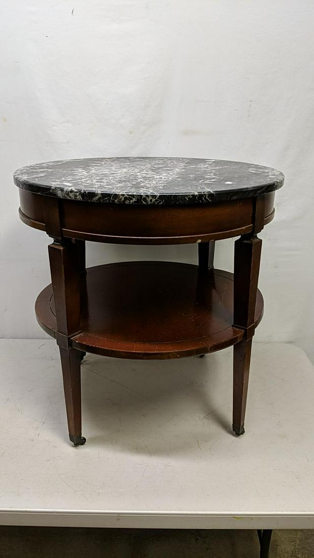 Round mahogany marble top side table: Bottom shelf warped on end 25 3/4" T x 25 1/2" diameter marble is good