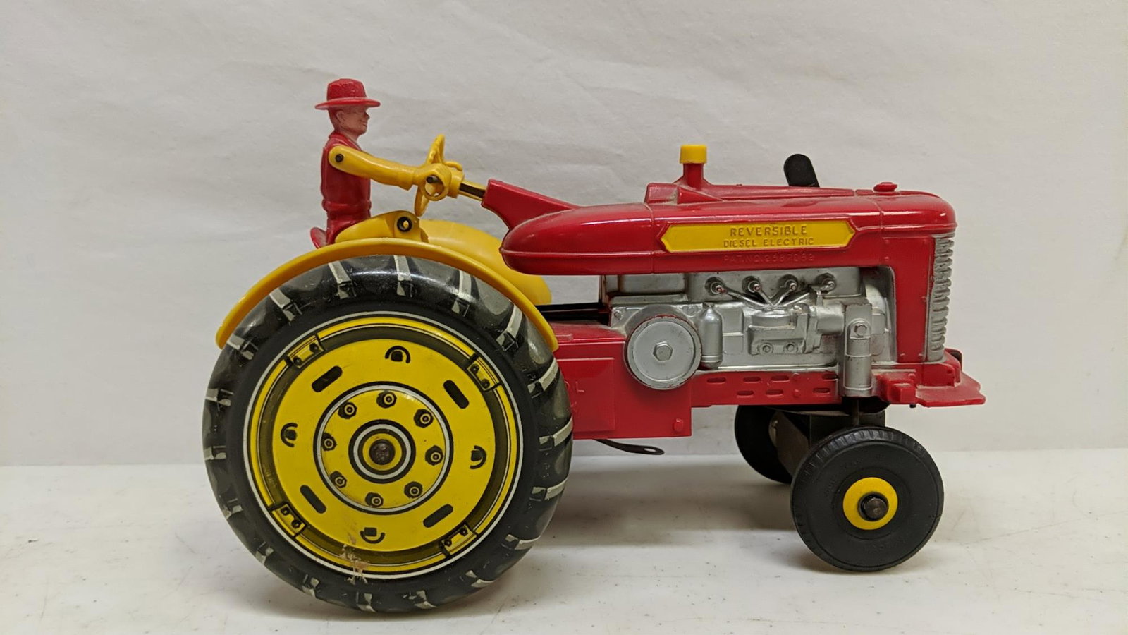 Vintage plastic and metal toy tractor "Toolboy": takes batteries used 10" L x 6 1/2" T