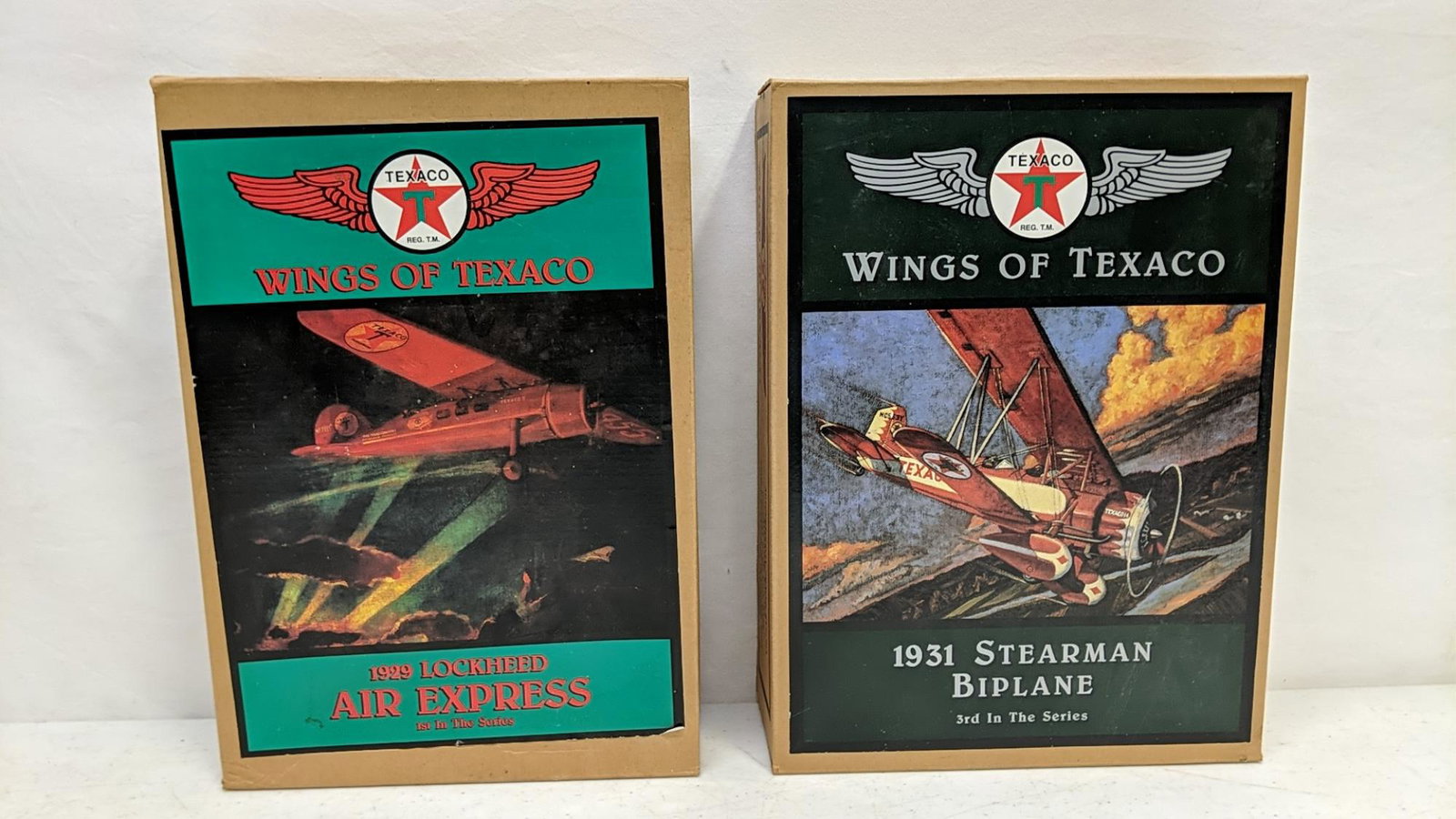 2 Texaco Wings of Texaco Diecast planes: 1 st and 3rd series 1931 Stearman Biplane 3rd in series 1929 Lockheed air express 1st in series New in Box