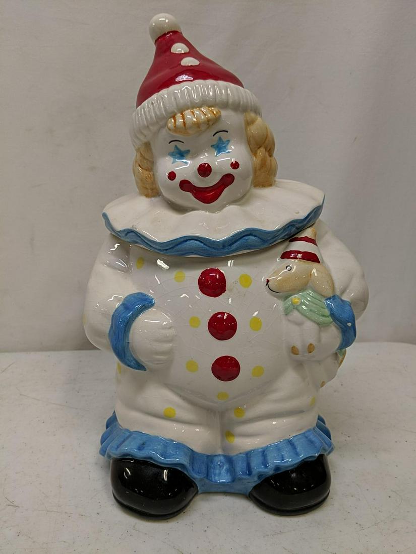 Vintage white clown cookie jar: red hat and holding a dog 13" T