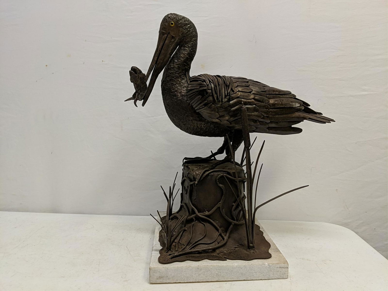 Brown Pelican with fish metal sculpture (1 of 9)