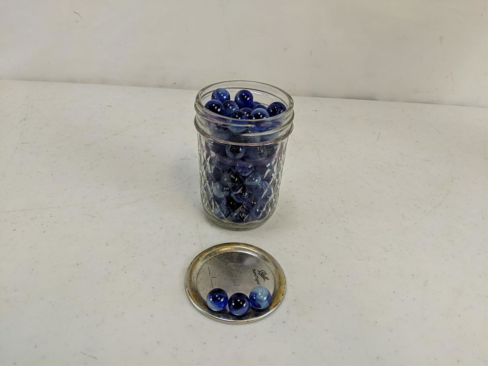 small jar blue mini marbles (1 of 1)
