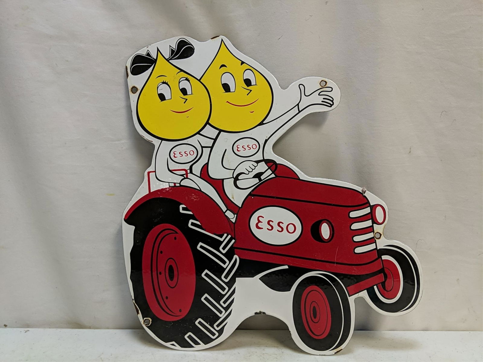 Esso Porcelain Tractor sign - oil drop characters (1 of 2)