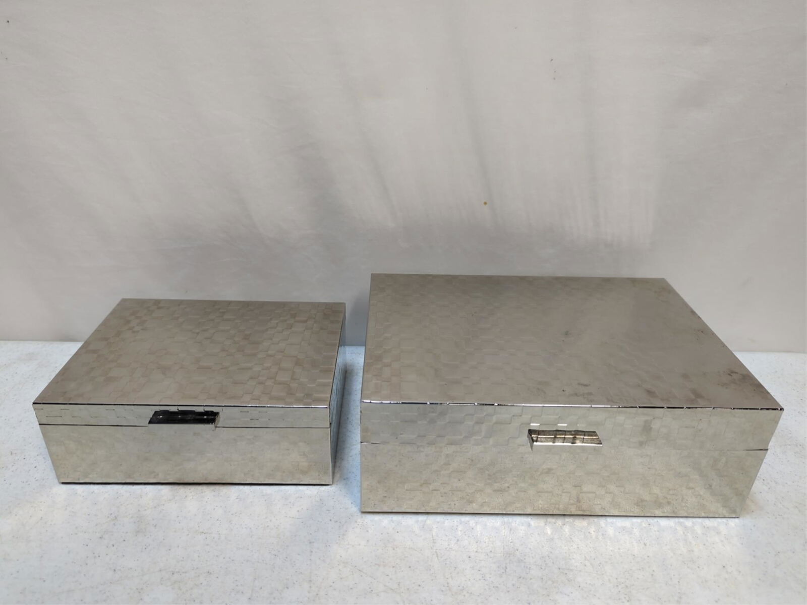 2 Chrome block pattern jewelry boxes: Felt lined 11 3/4" L x 8 1/4" d x 4 1/2" T and 8 3/4" L x 6 1/2" d x 3 1/4" T