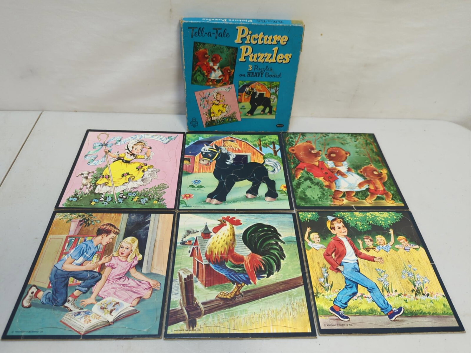 Box of 6 vintage Tell-a-tale puzzles: by Whitman Publishing Co. all pieces are there