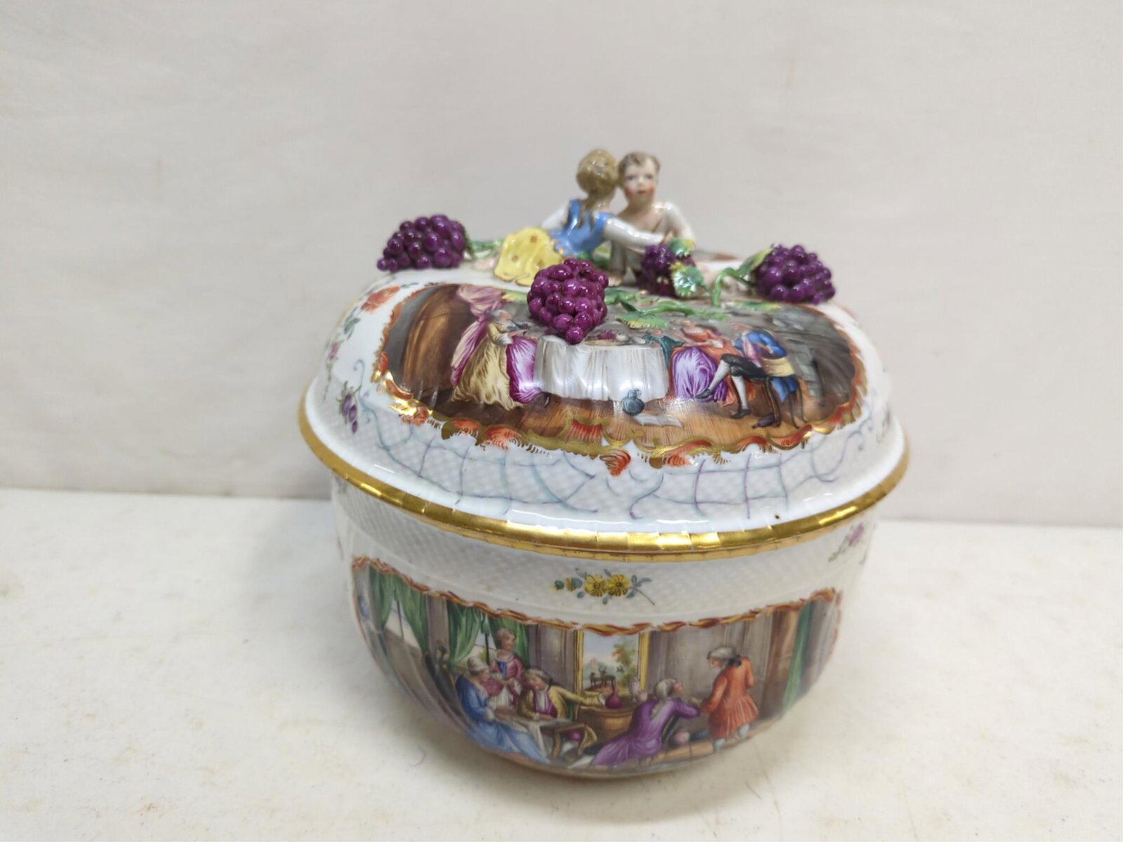 Vintage Dresden Style Porcelain Tureen: hand painted with applied figures and grapes gold trim 10 " diameter x 9 1/2" T