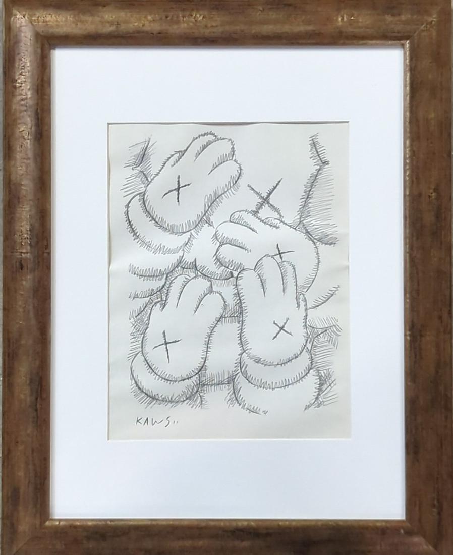 Kaws hand drawing of hands on paper (1 of 3)