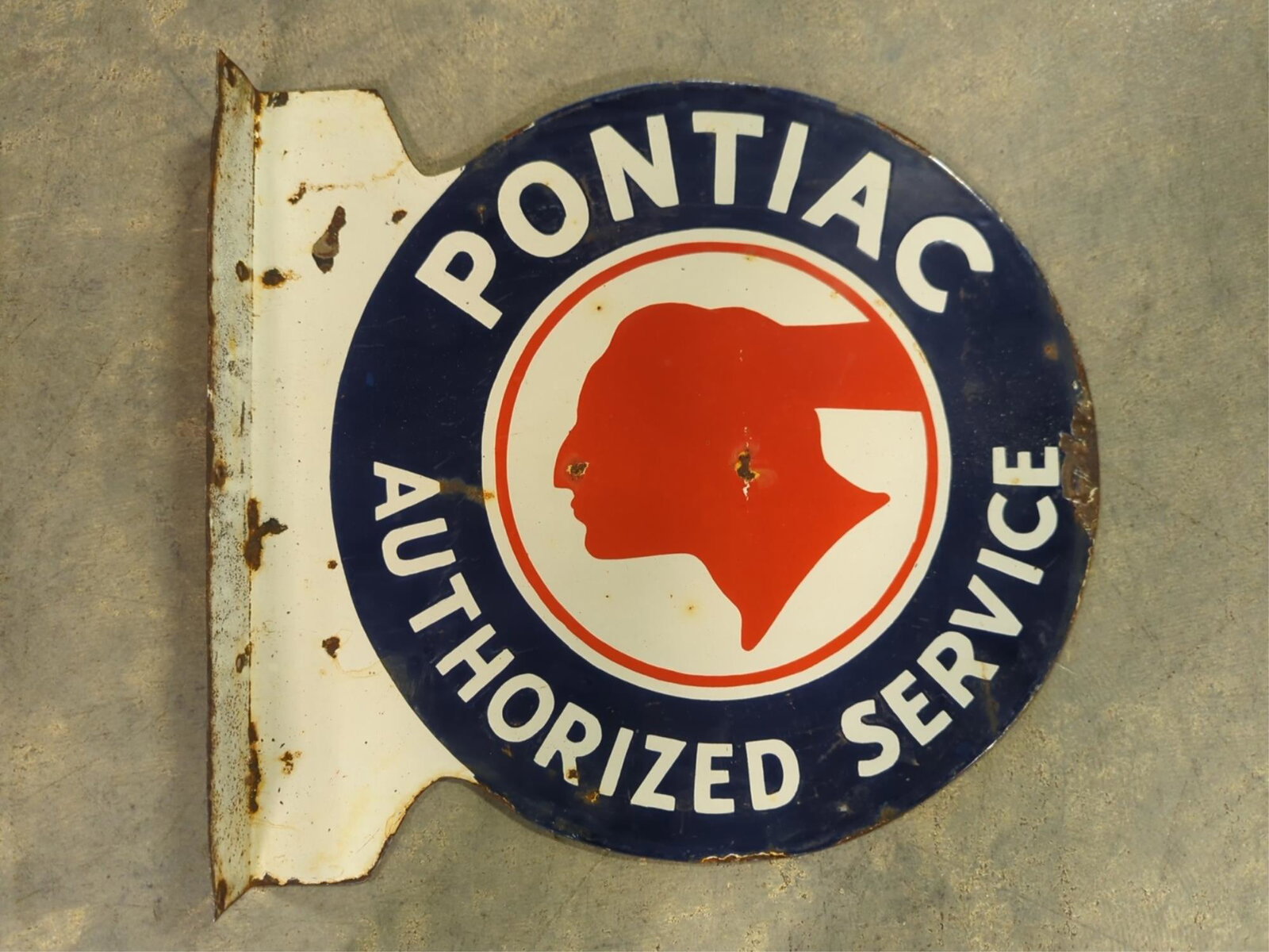 Pontiac Porcelain Flange Sign: 20" W x 18" T some dings to interior and perimeter with rust and corrosion