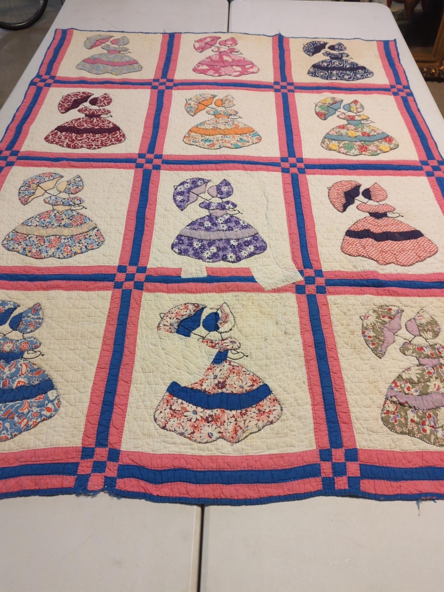 Antique hand made Sue Bonnet Sue quilt: some minor fraying around edges some folding stains on back 72" x 55"