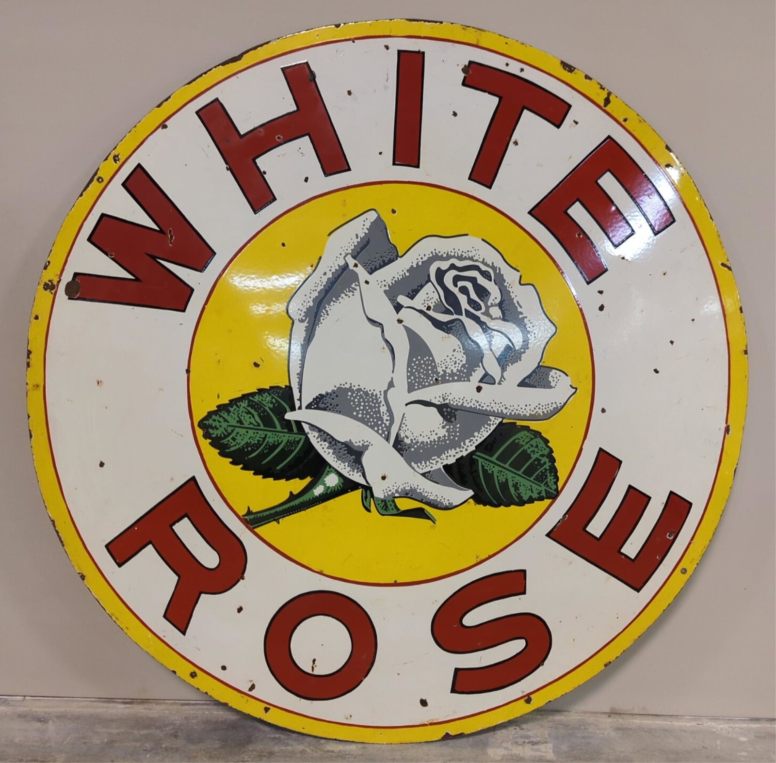 48" Porcelain double sided White Rose sign: Minor rust and corrosion on perimeter and some dings