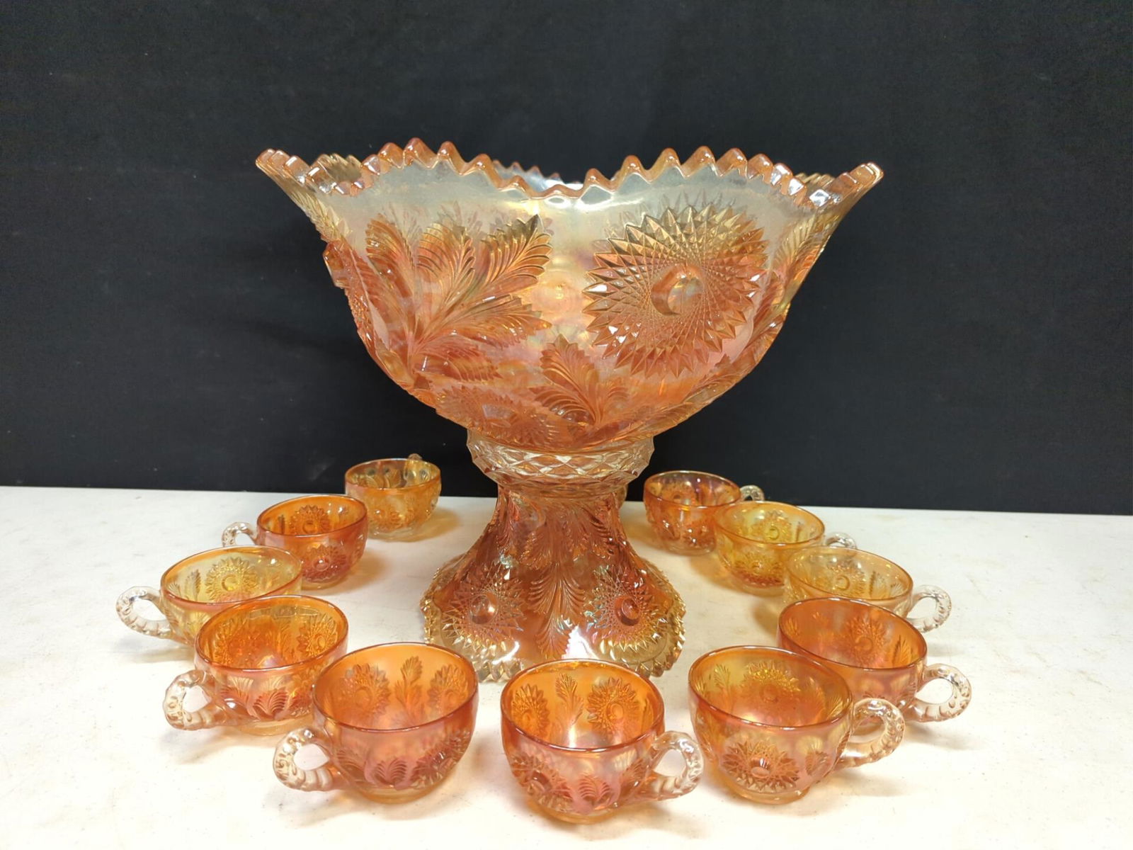 14 pc. Marigold Carnival glass punch bowl set Jul 16, 2022 Heritage