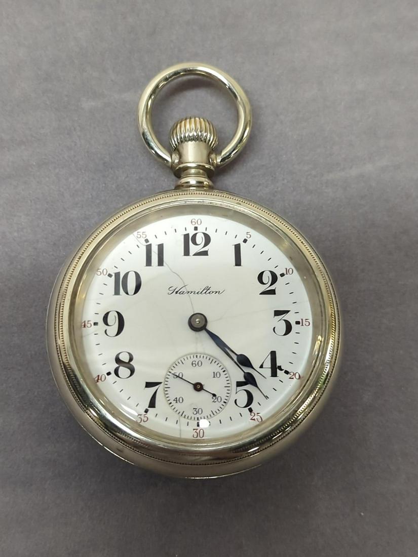 Hamilton 17 jewel pocket watch: Swing Out case is A.W. Co., Serial # 993763 Now running but no watches or clocks are guaranteed
