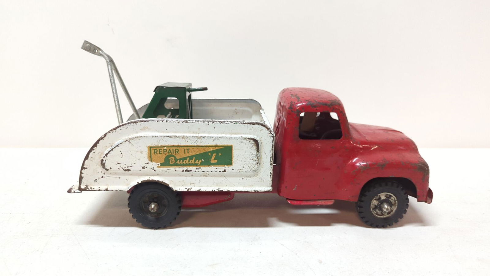 Vintage Buddy L Wrecker: 14 1/2" L x 5" W x 5 1/4" T some paint missing