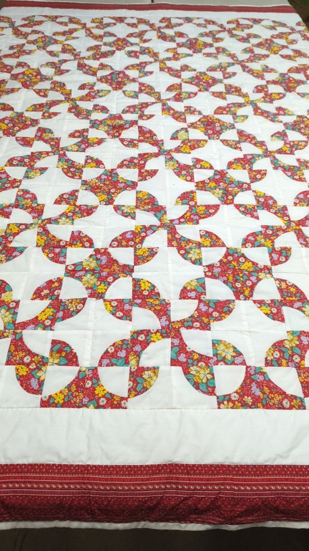 hand made pin wheel quilt: Red and white 94" x 77"