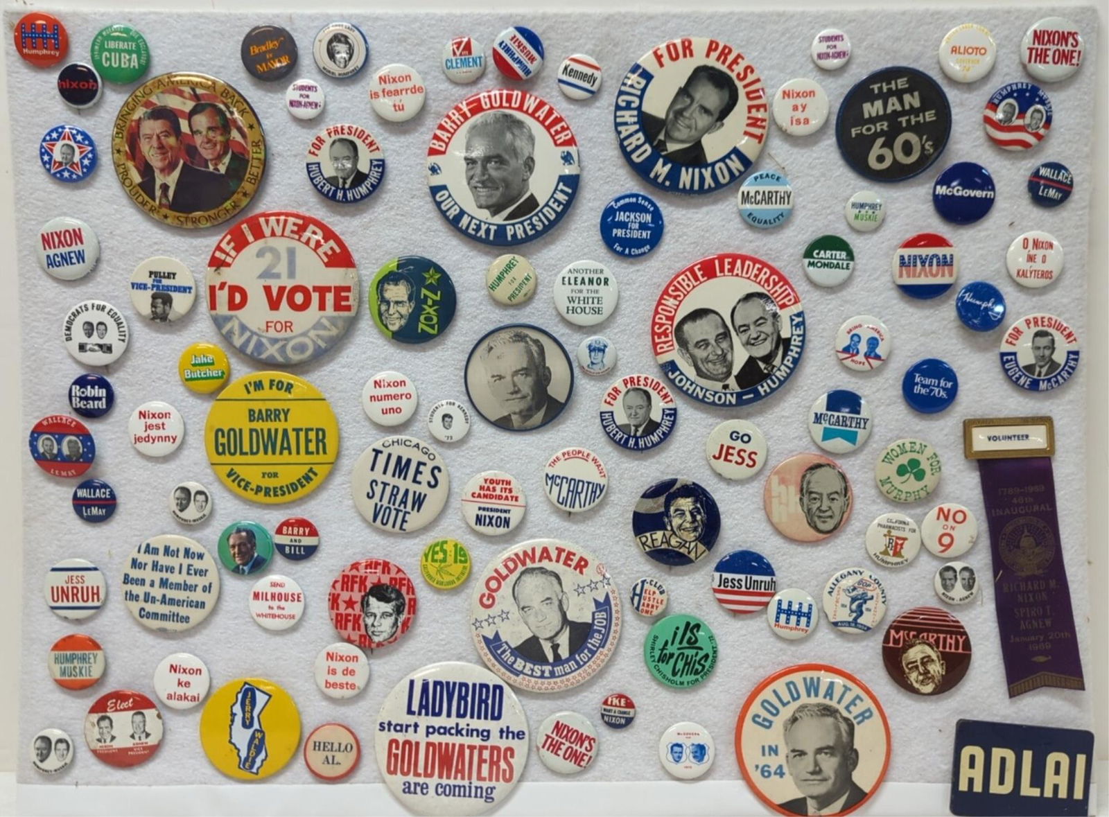 Display approximately 100 vintage political pins (1 of 1)