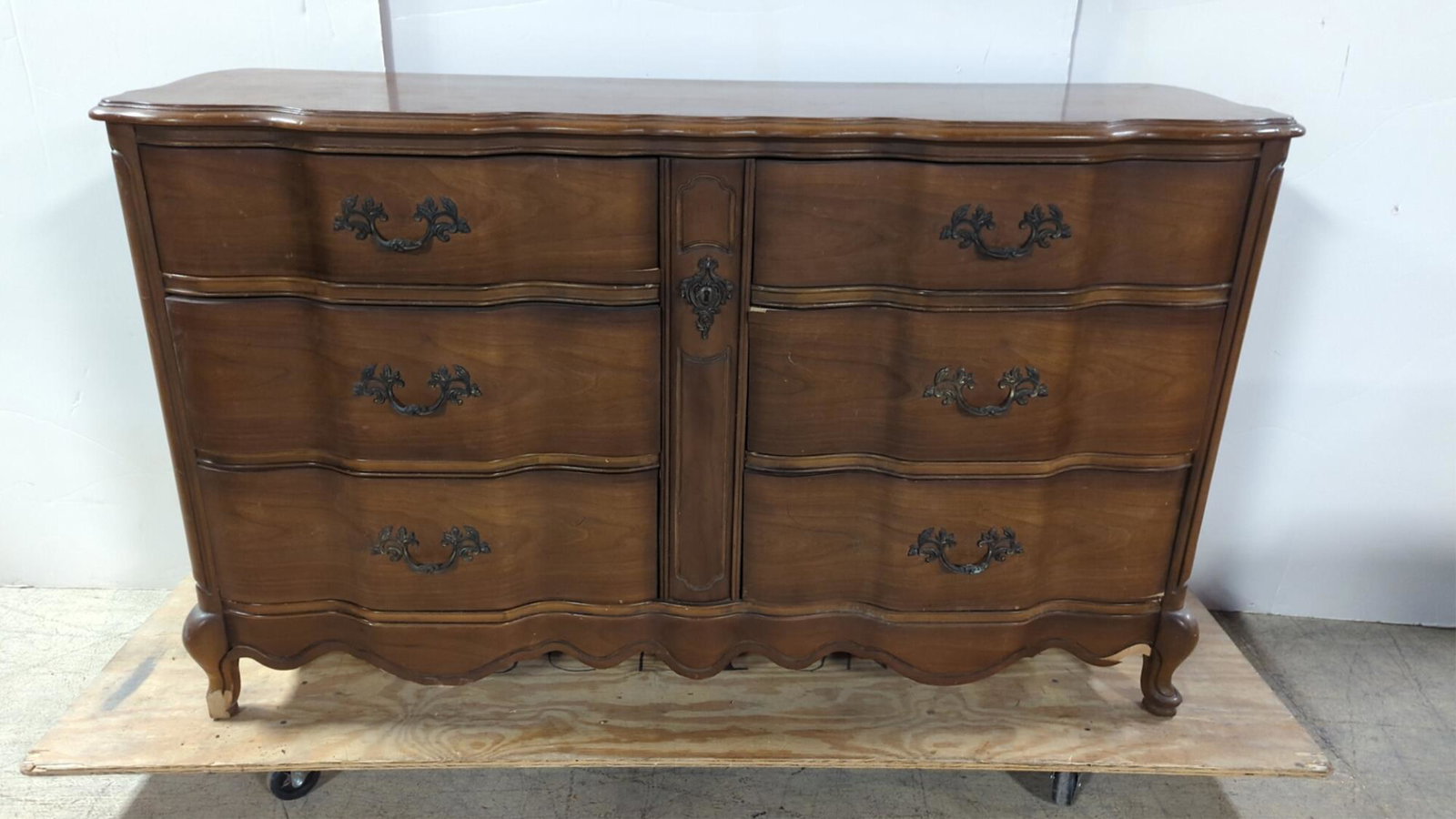 Bassett Walnut French Dresser w/ 6 drawers: AS IS has some damage to foot and bottom piece of veneer good fixer upper to paint