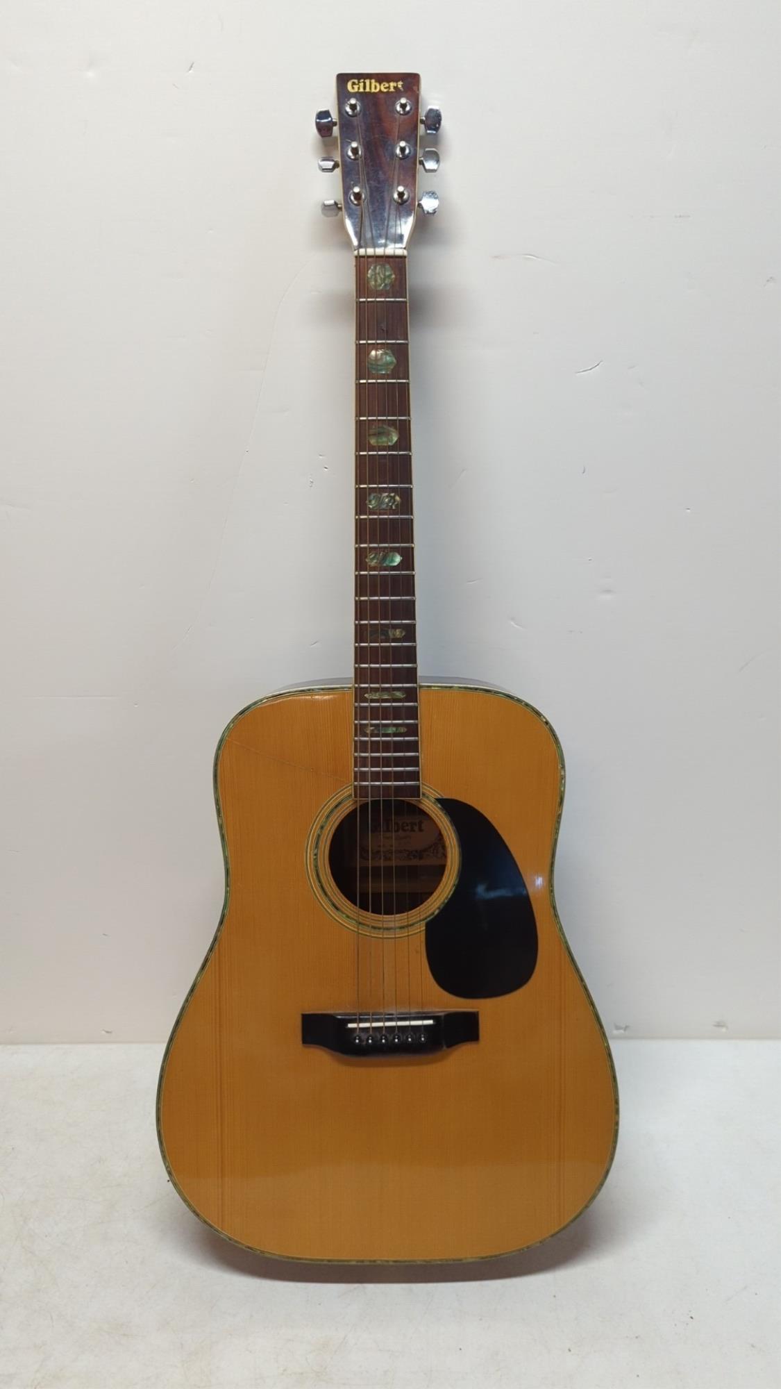 Gilbert Model W - 275 Acoustic Guitar: has one scratch on from and scratch and crack on back
