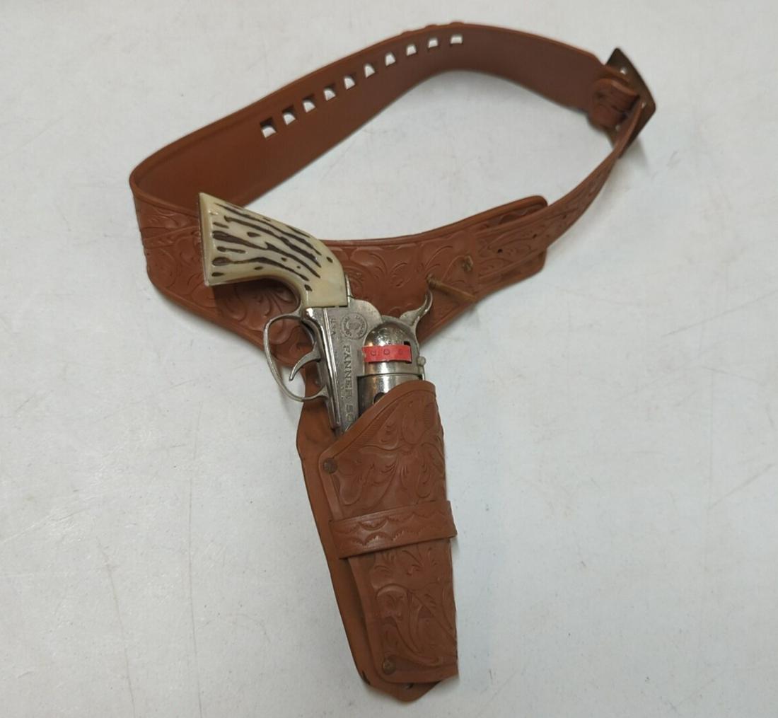 Original Vintage Fanner 50 Cap Gun and holster: plastic holster includes 1 box of caps good condition made by mattel gun is 10 3/4" lon