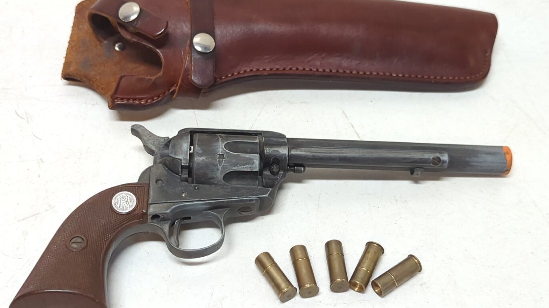 Single Action 44 Revolver Replica: includes 5 bullets - blanks leather holster Bucheimer