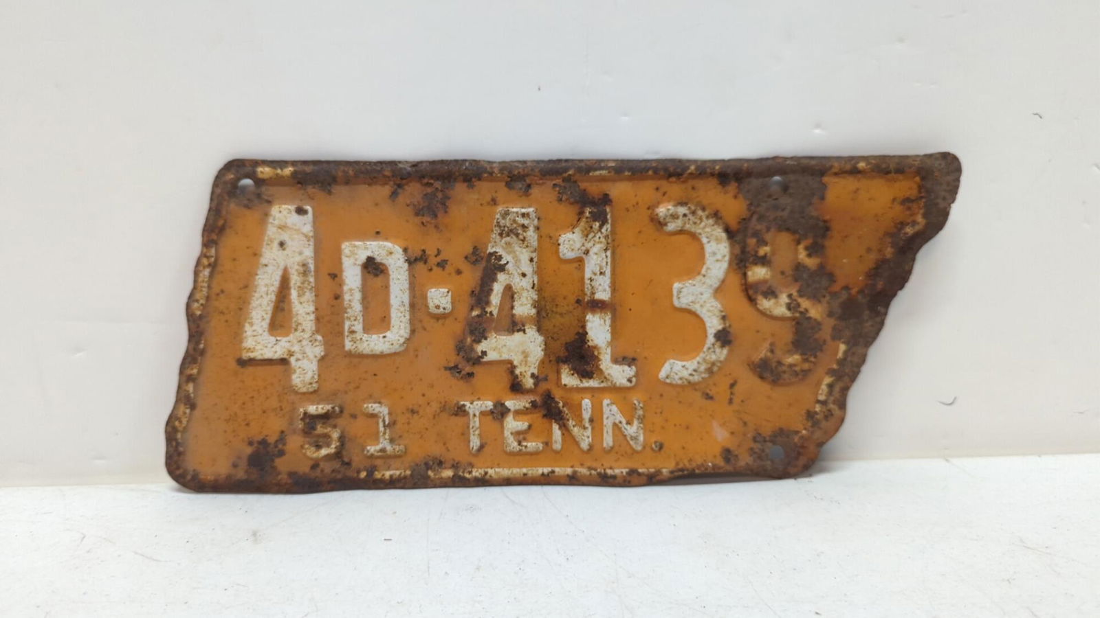 Original 1951 Tennessee license plate: Lot of rust and corrosion but very sought after 13" W x 5 1/2" T