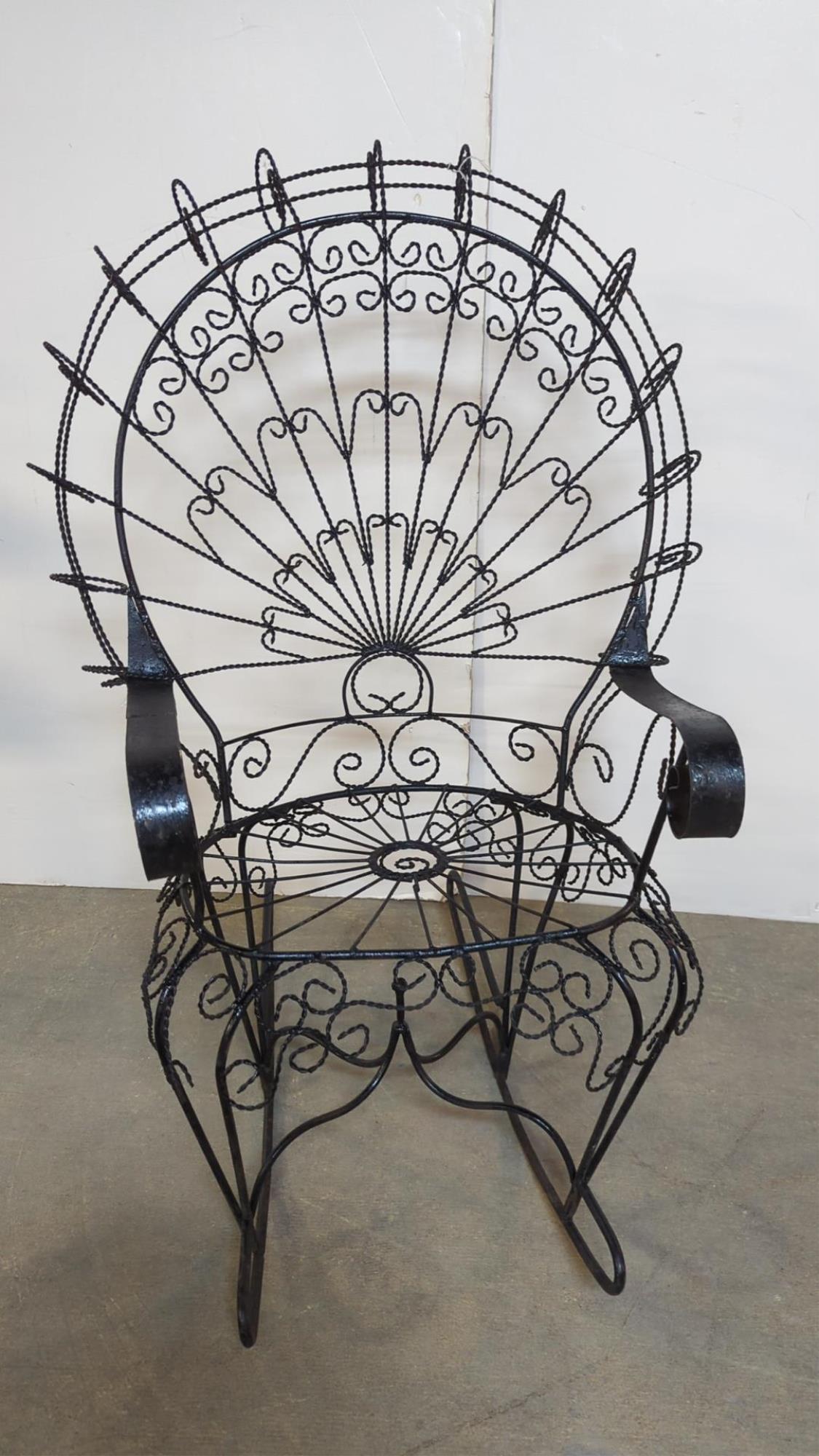Twisted wrought iron ornate Peacock rocking chair: Good Condition 48" t x 34' W x 19" d