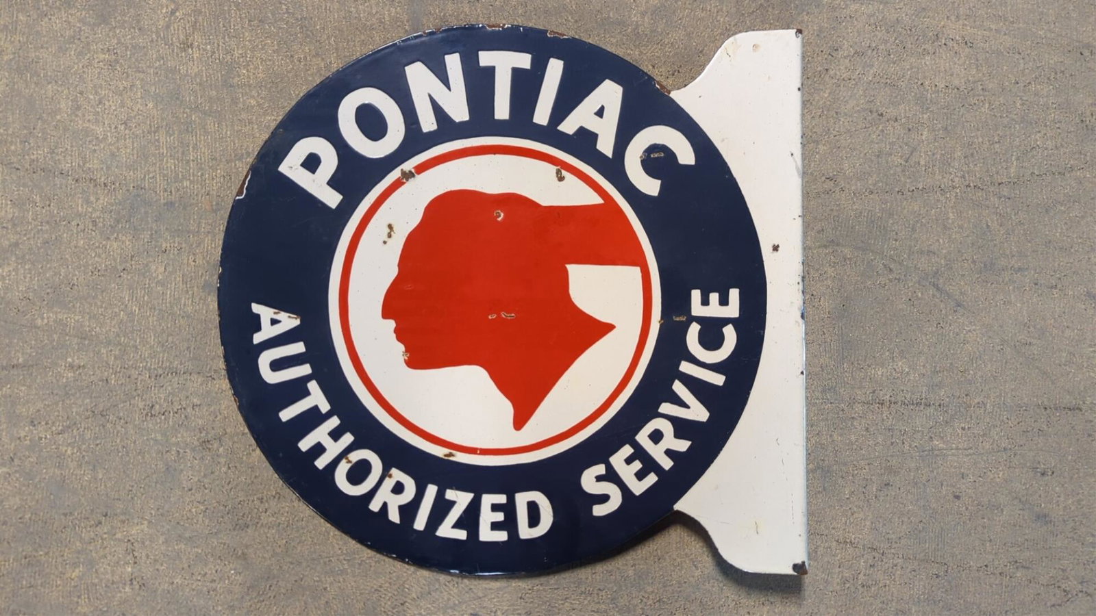 Pontiac Porcelain double sided flange sign: Very minor dings to interior and edges minor rust 18" x 19" W